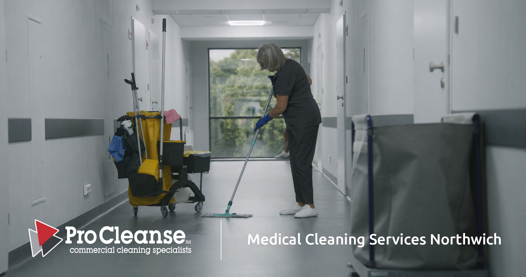 medical cleaning service specialist in medical centre hallway